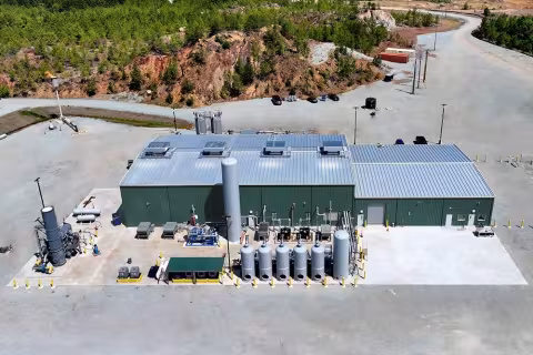 Anaerobic digesters, gas cleanup systems, and pipeline interconnection equipment